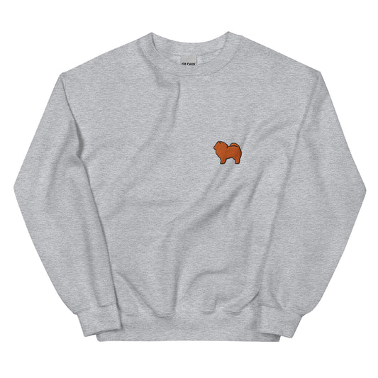 Sweatshirt gris unisexe avec illustration kawaii de chow chow fluffy sur le devant, coupe confortable et style décontracté pour un look cosy au quotidien.